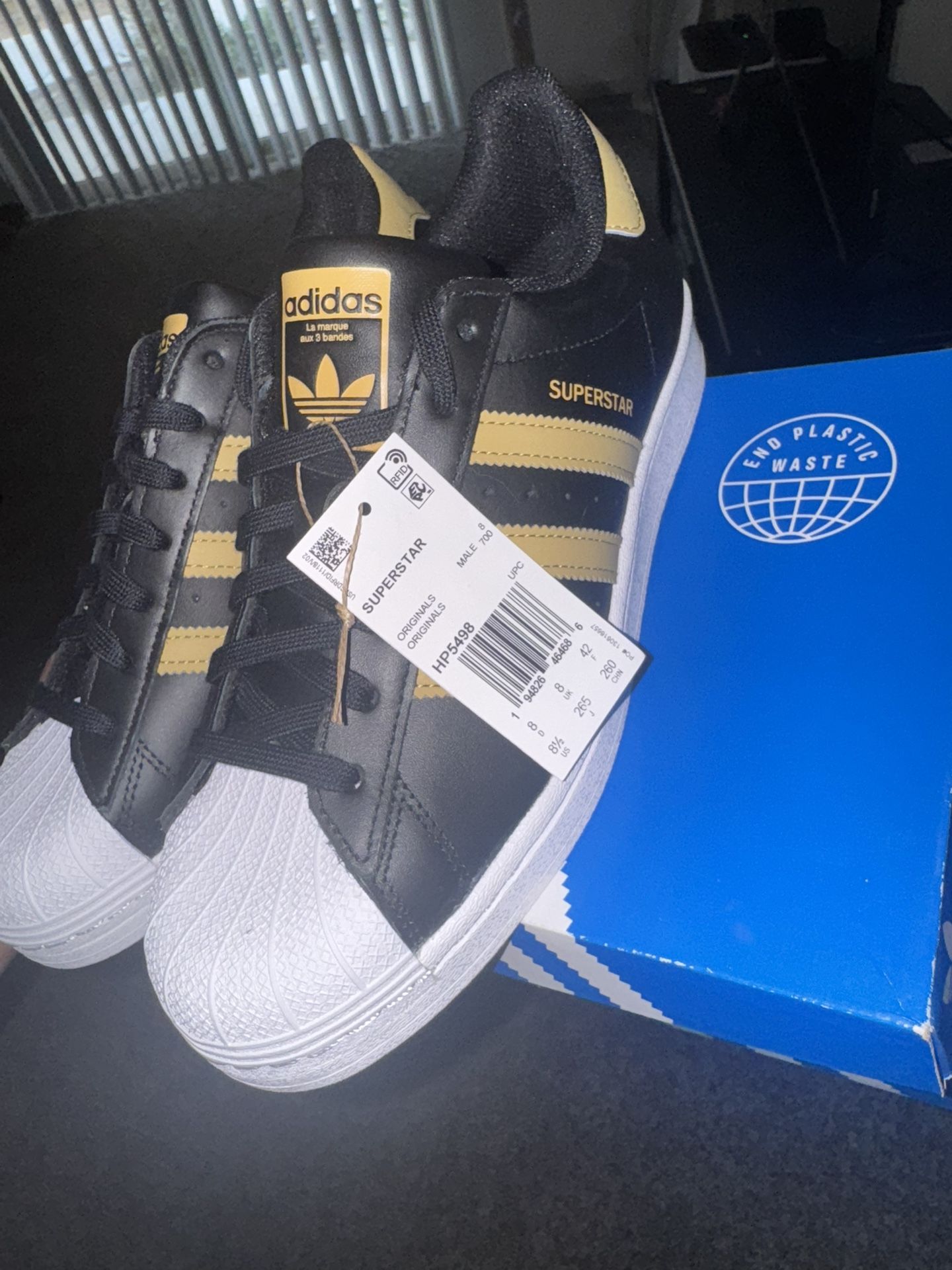 Men’s Black Gold Adidas Size 8/2