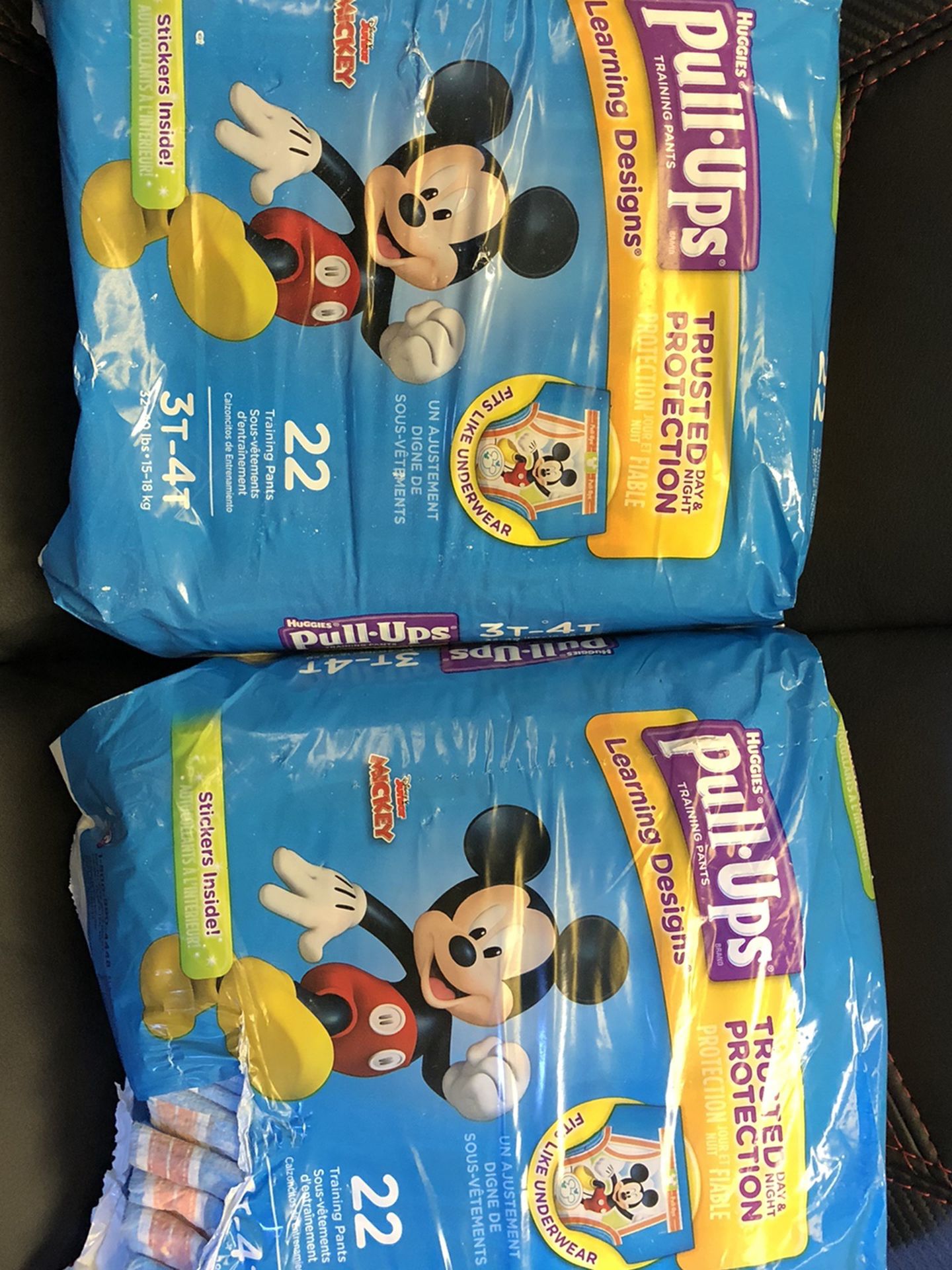 Two packages of Huggies Pullups