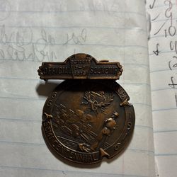 This is a vintage commemorative badge related to a New Jersey silver war veteran