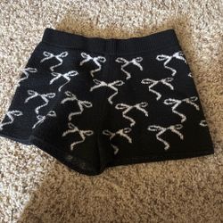 Black Knit Shorts with Bow Print