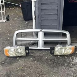 Dodge Ram  02 - 10 Grille And Head Lights