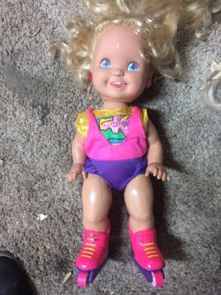 Vintage roller blading doll