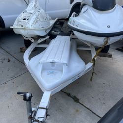 PWC Trailer And 2000 Yamaha GP 1200 And Kawasaki X2 Hulls