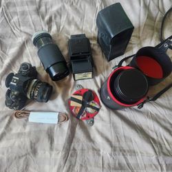 Cannon A1 +2 Lenses, Flash, and Leather Strap