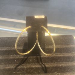 Woman’s Yellow Gold Hoops 