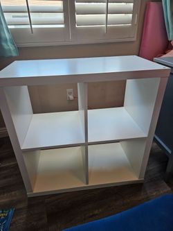 White Ikea Kallax 4-Cubby Shelf