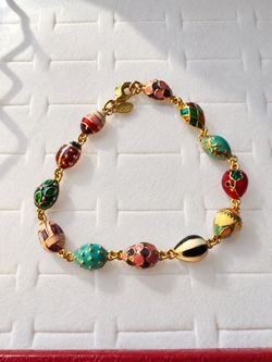 Vintage Joan Rivers golden egg bracelet
