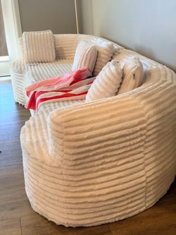 Almost New cream corduroy curved sofa