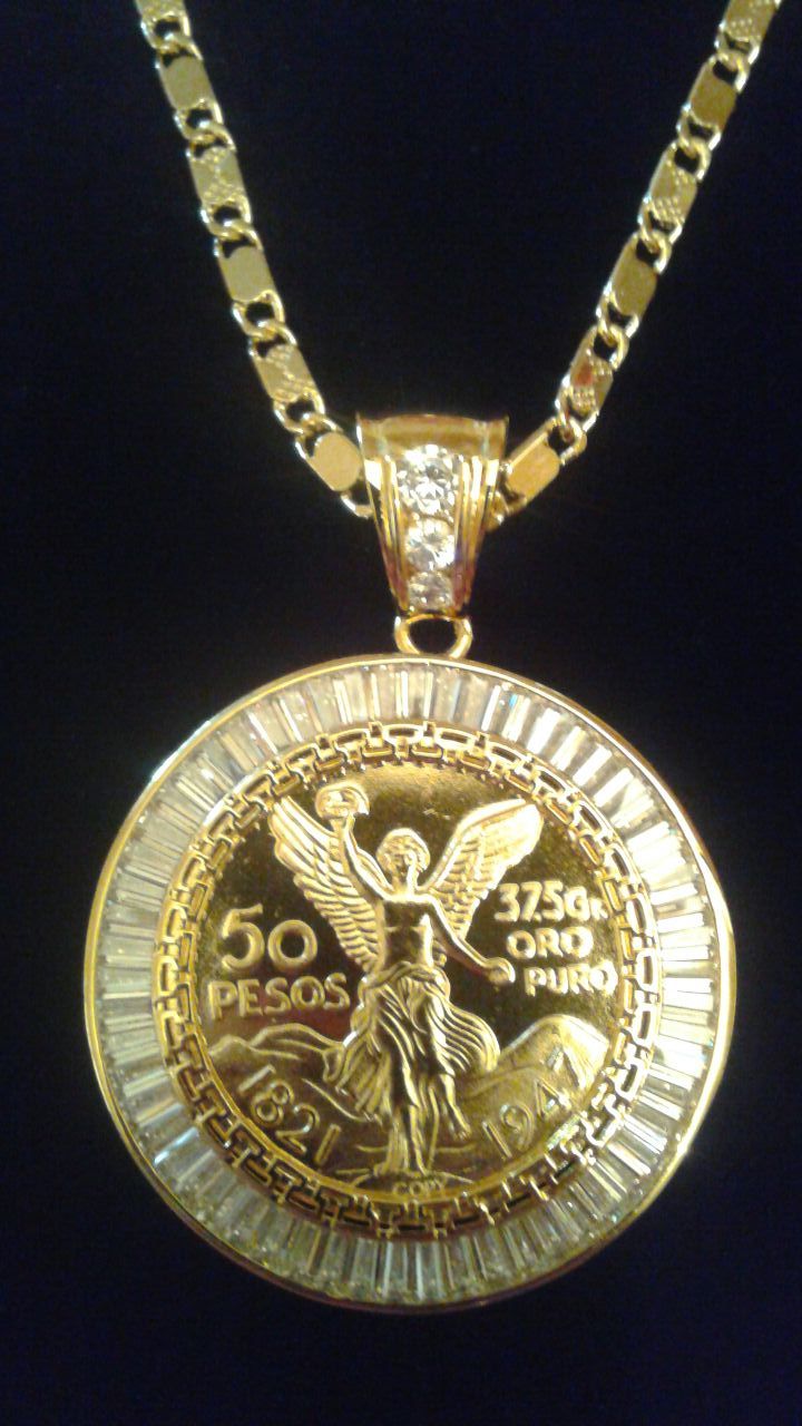 Centenario de oro laminado brazileƱo.