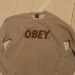 Obey vintage cheetah pring logo woman sweater crop  size s selling $10
