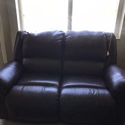 Ashley’s Furniture - 2 seater recliner sofa