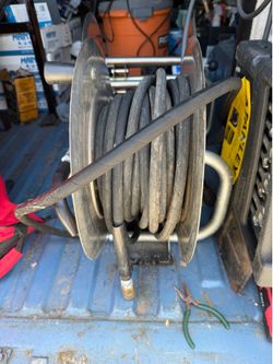 Reel and pressure water hose