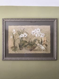 Painting of white flower in vase with brown wooden frame
