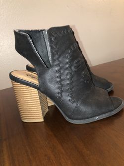 Black leather peep-toe stacked heel booties