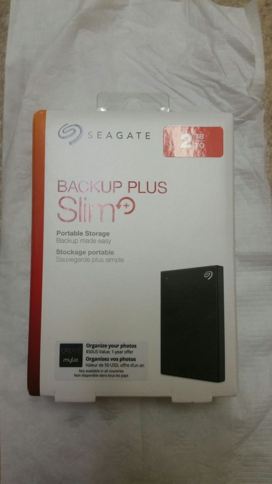 Brand new unopened Backup plus slim 2TB