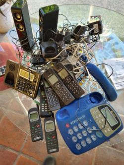 Box Full Of Working Phones And Alarm Clock