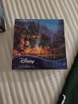 Puzzles. Thomas Kinkade. Disney