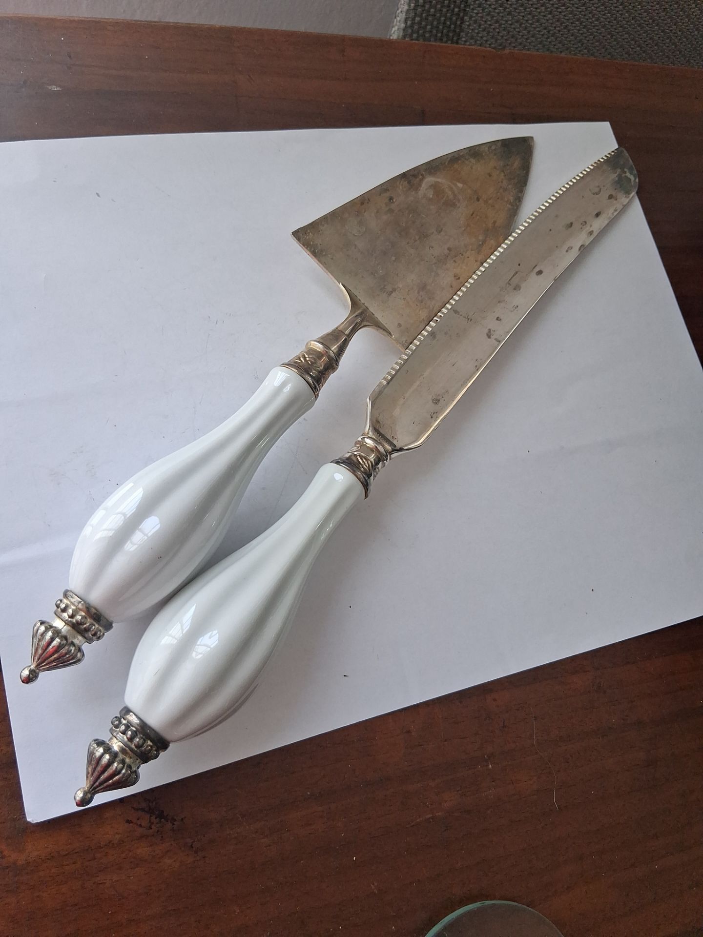 vintage Godinger Silver Art Co. cake knife and server set featuring white porcelain handles.