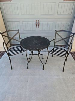 Three-piece outdoor wrought iron bistro set