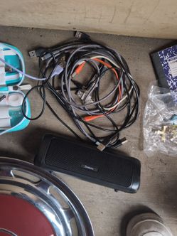 chargers and cables and a speaker