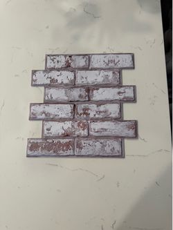 Brand new in box, 30  sq feet of 3D Peel and stick wall covering/kitchen back splash