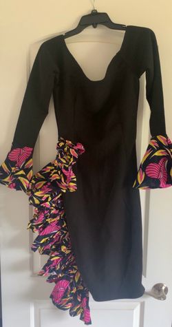 A Fun and festive black pencil dress. (Size Large)