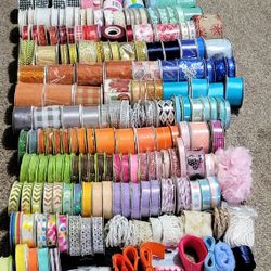 Attention Crafters! Over 200 rolls of ribbon, new and unopened, w/ some large remnant pieces