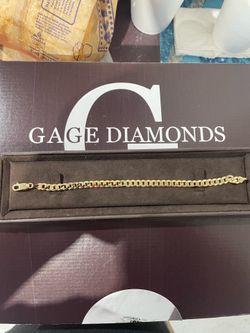 14kt Yellow Gold Flat Beveled Curb Bracelet