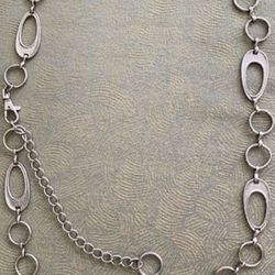 Vintage Metal Silver Hoop Shaped Women’s Belt 40” Long With Removable chain Extension  In excellent condition  Size M-L