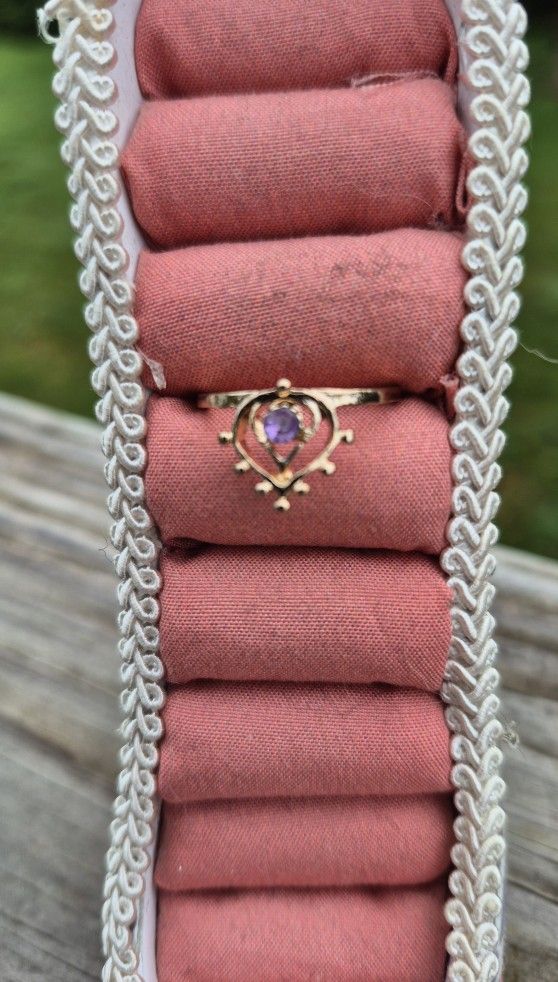 Gold Tone Ring With Amethyst Colored Crystal