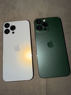 Two IPhone 13 Pro Max, one is green and one is gold