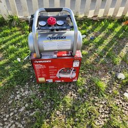 Husky
2 Gal. 135 PSI Portable Electric Oil-Free Quiet Jobsite Air Compressor with Dual Pressure Gauges and 1-Quick Coupler