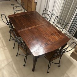 6 person dining table with table extension and 6 chairs