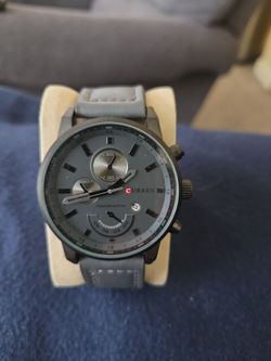 Curren watch.  Working