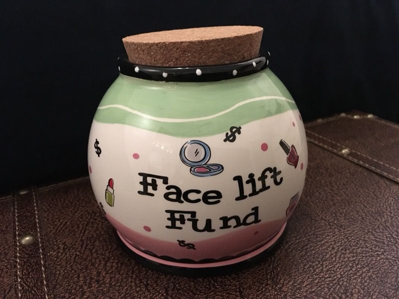 Face lift fund ceramic money jar
