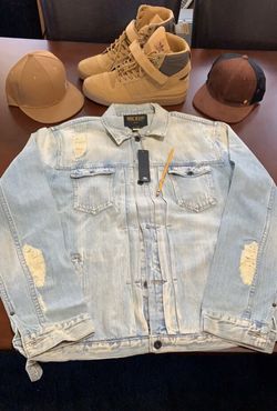 Blue Denim Jacket light rinse. New tags attached.