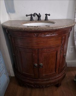 Ornate Wood Bathroom Vanity with Granite Top