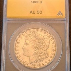 1886 Morgan Silver Dollar ANACS AU50  -  Genuine 