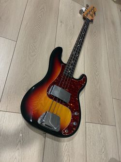 1983 vintage Squier Japan  SQ Precision Bass Sunburst.