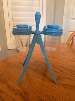 $12 - Gently used or New Tupperware Midgets Salt & Pepper Shakers with Retro Tripod Stand and toothpick holder.  Blue Shaker Seals and Lids.  Clear 2-