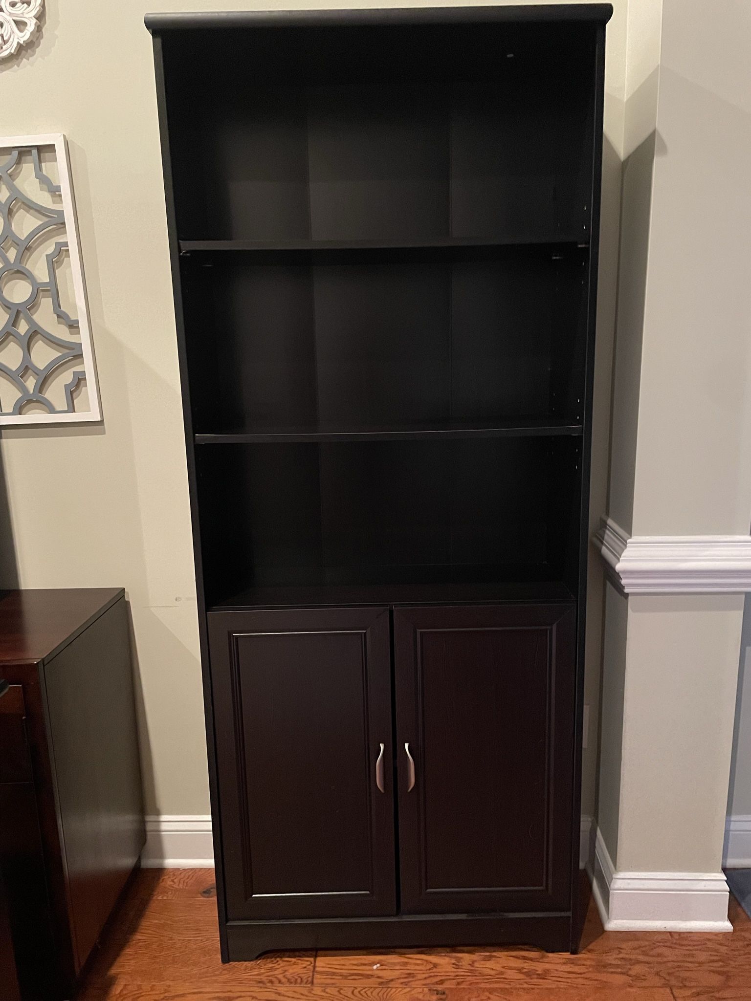 Tall Black Bookcase ………Like New