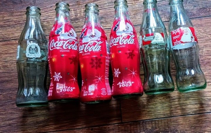 Coca-Cola Collectible Glass Bottles – Holiday & Sports Edition, 6 Empty, 8 fl oz
