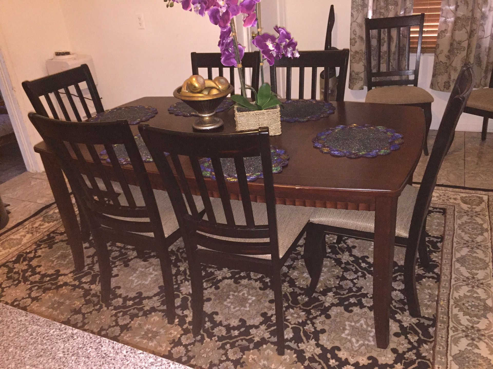 Kitchen table with one extension and 8 chairs