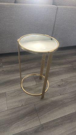 Gold mirrored side table