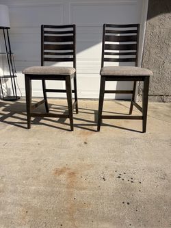 Dark wood barstools