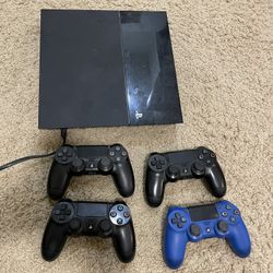 PlayStation 4 (PS4) W/ Games & 4 Controllers