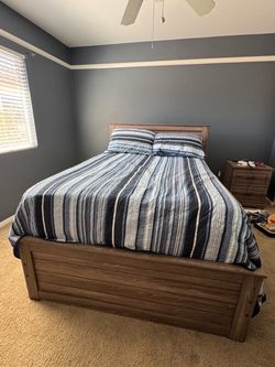 Ashley Furniture- Full Wood Bed w/ matching nightstand