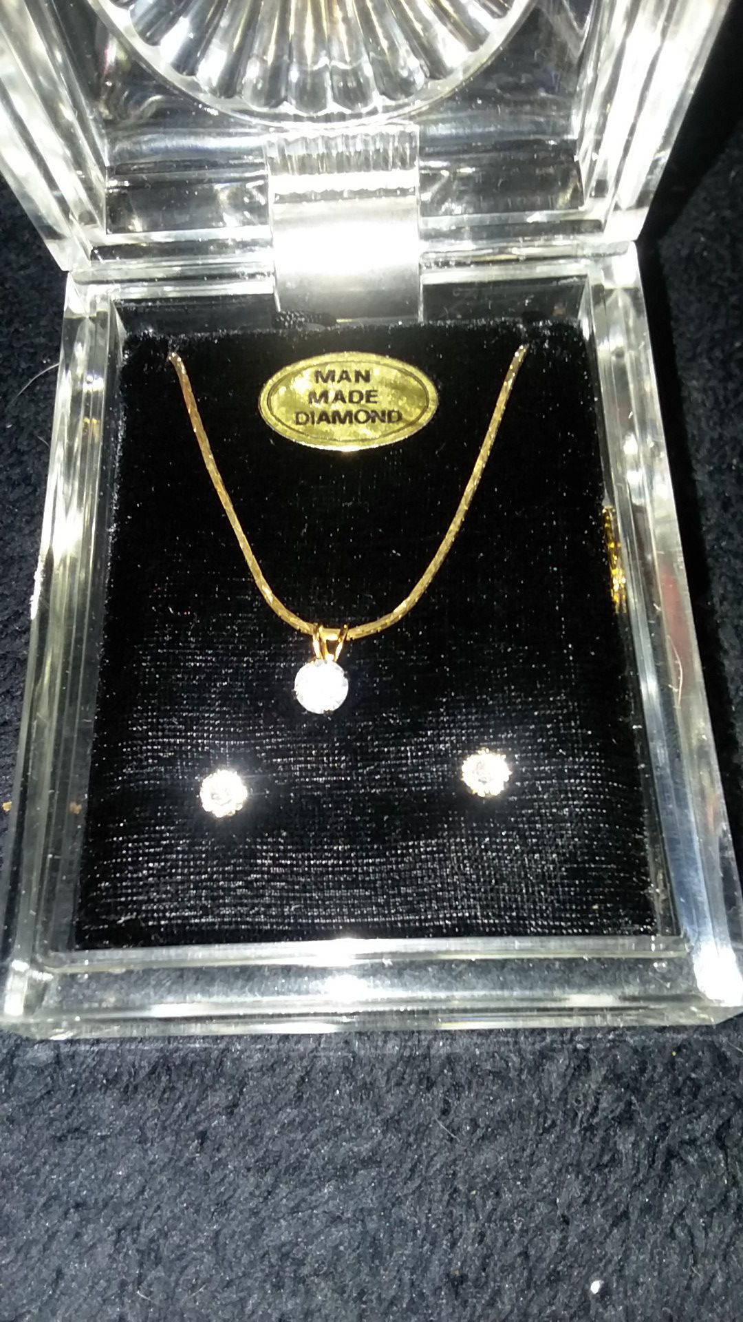 Gold toned diamond necklace and earring set
