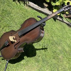 Half size cello with two bows