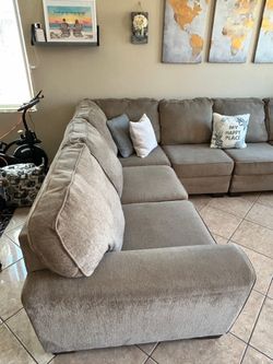 Beautiful Tan Sectional couch from Ashley Furniture